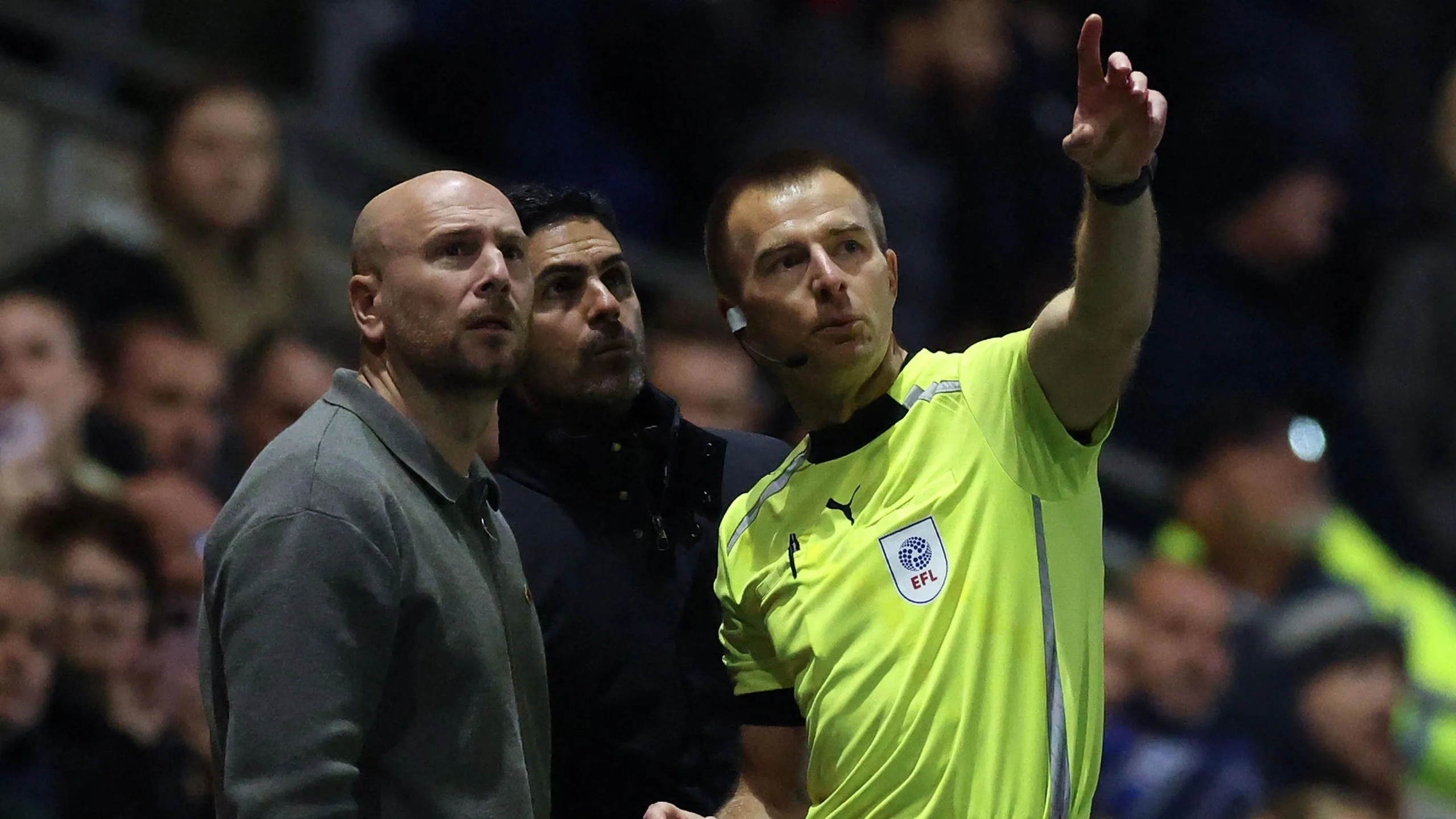 Referee Michael Salisbury spoke to both sides as play was halted