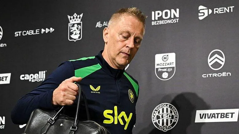 Heimir Hallgrimsson leaves the news conference room