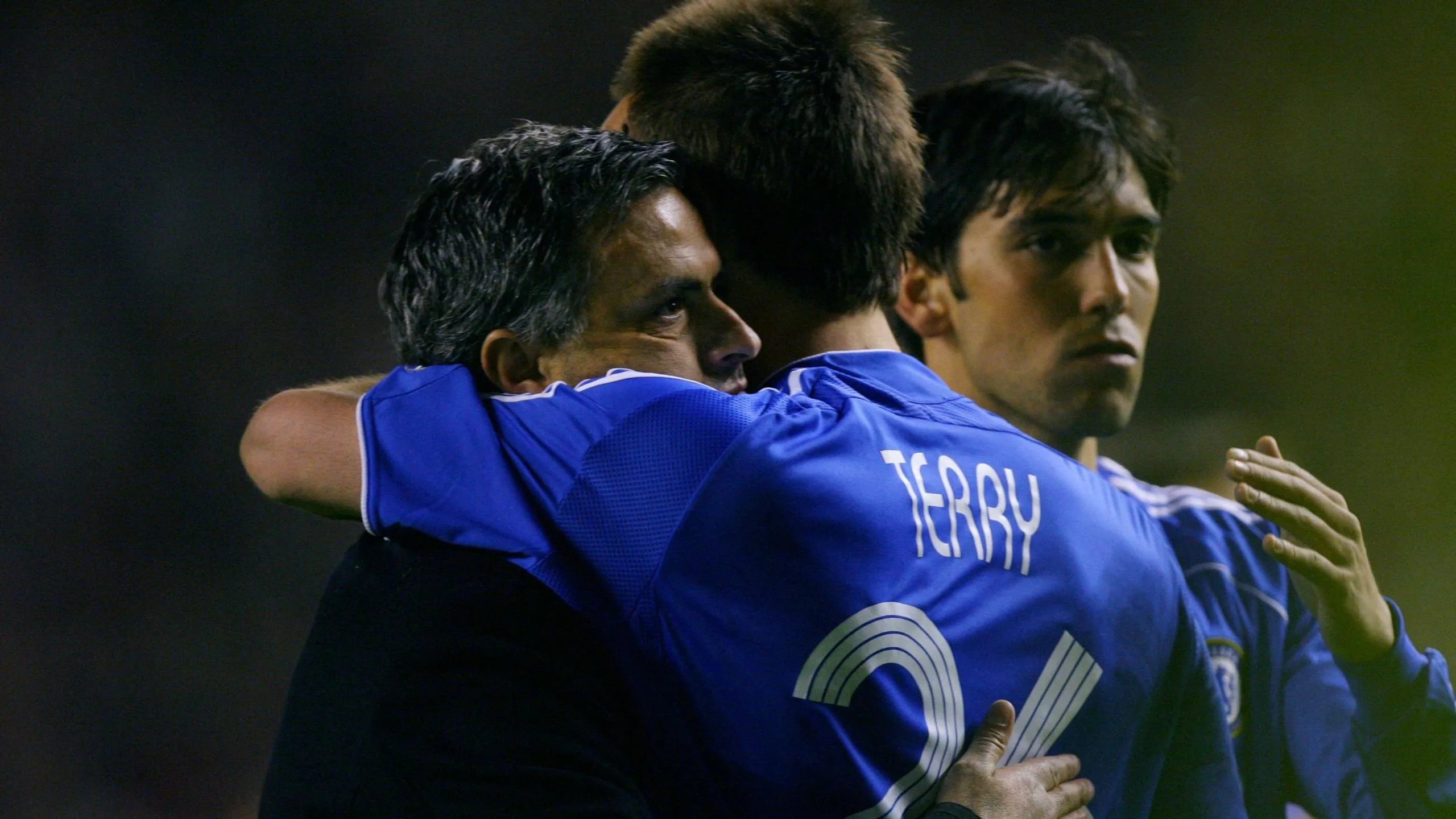 Image of Jose Mourinho and John Terry hugging.