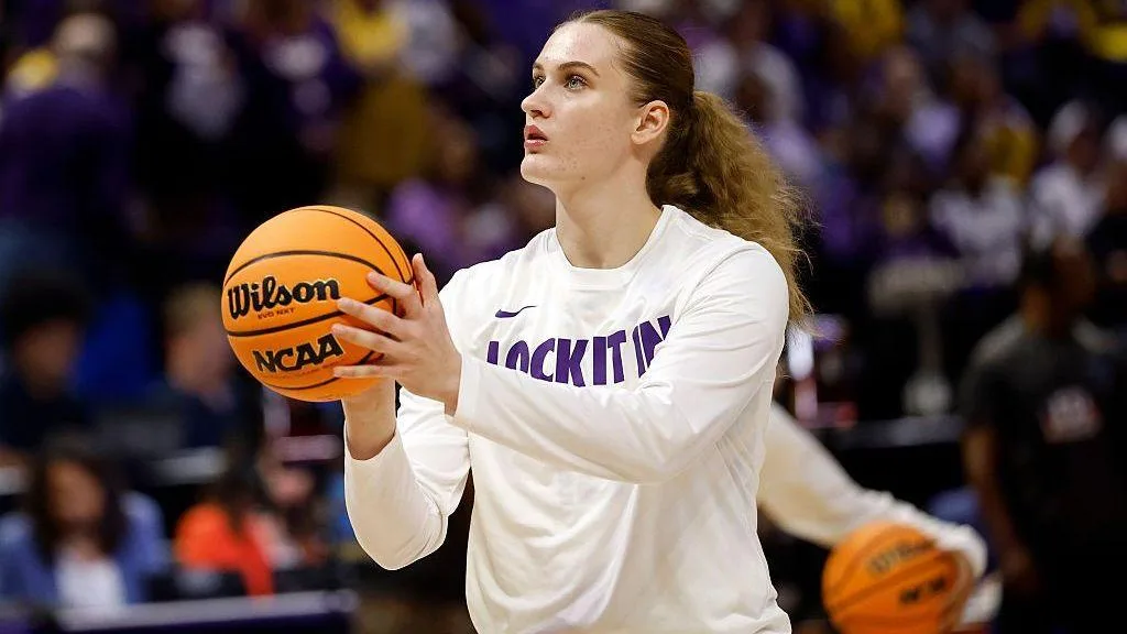 Kate Koval playing basketball for Louisiana State University