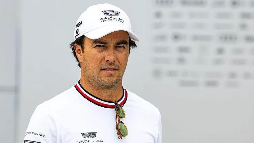 Sergio Perez, wearing  a white t-shirt and white Cadillac cap