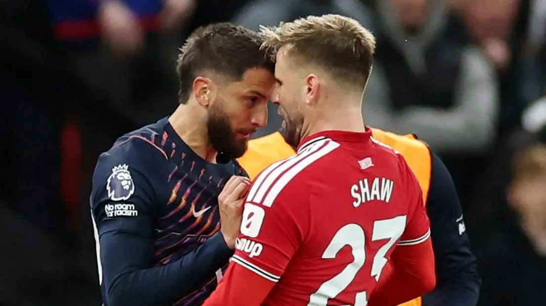 Tottenham's Rodrigo Bentancur and Manchester United's Luke Shaw go head-to-head
