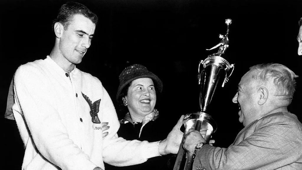 Bob Pettit is presented with the MVP trophy