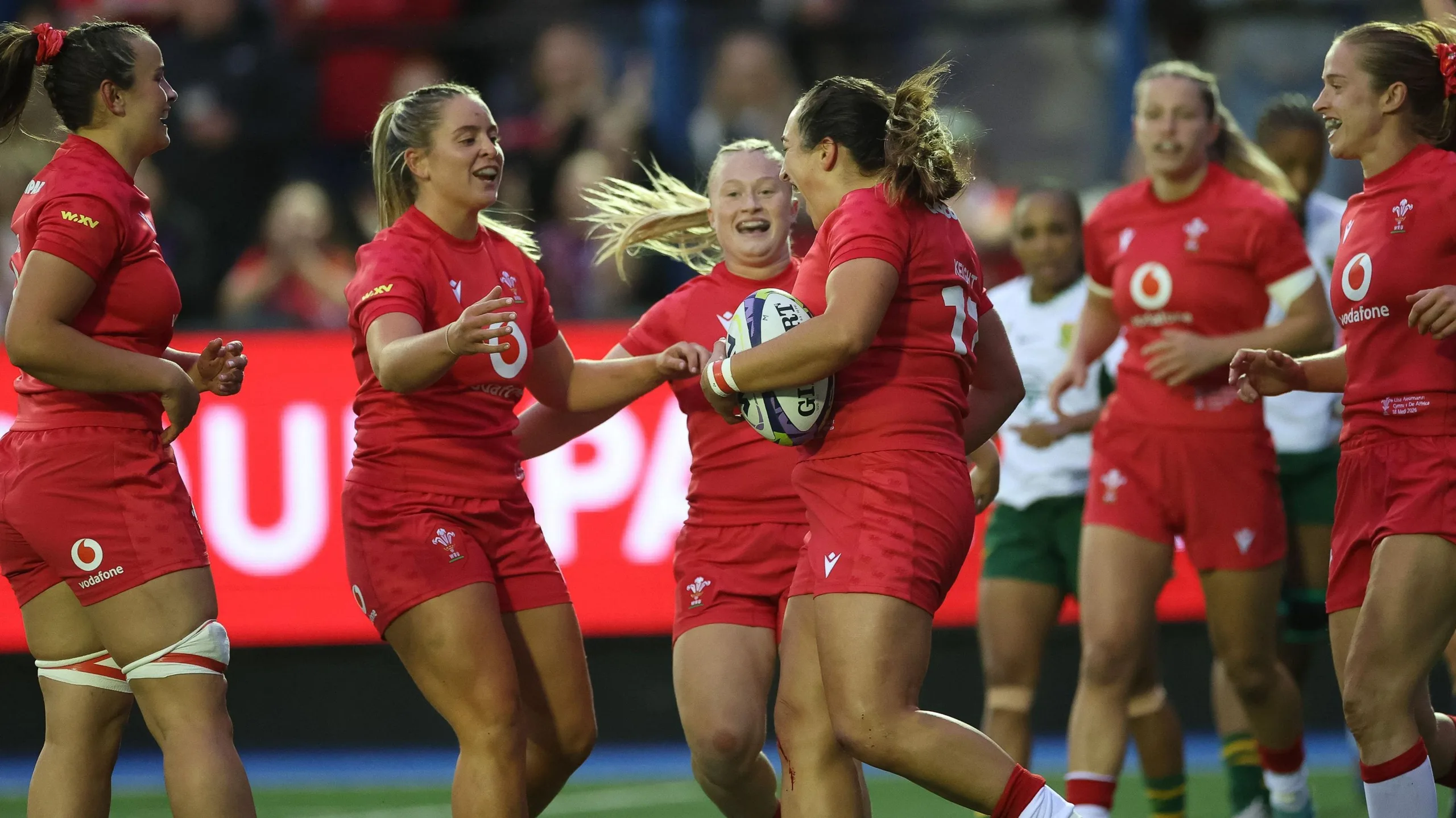 Courtney Keight celebrates with team-mates