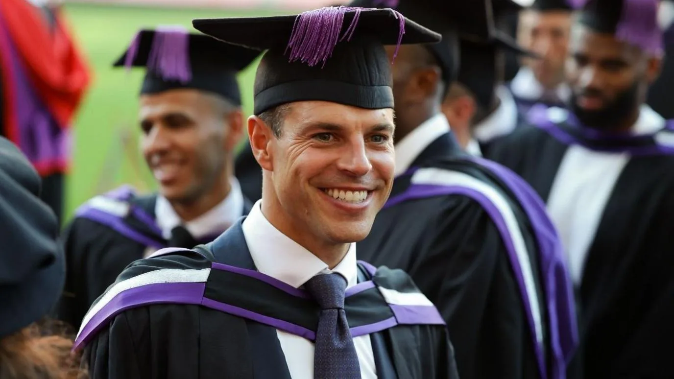 Cesar Azpilicueta dressed in a gown and mortar board