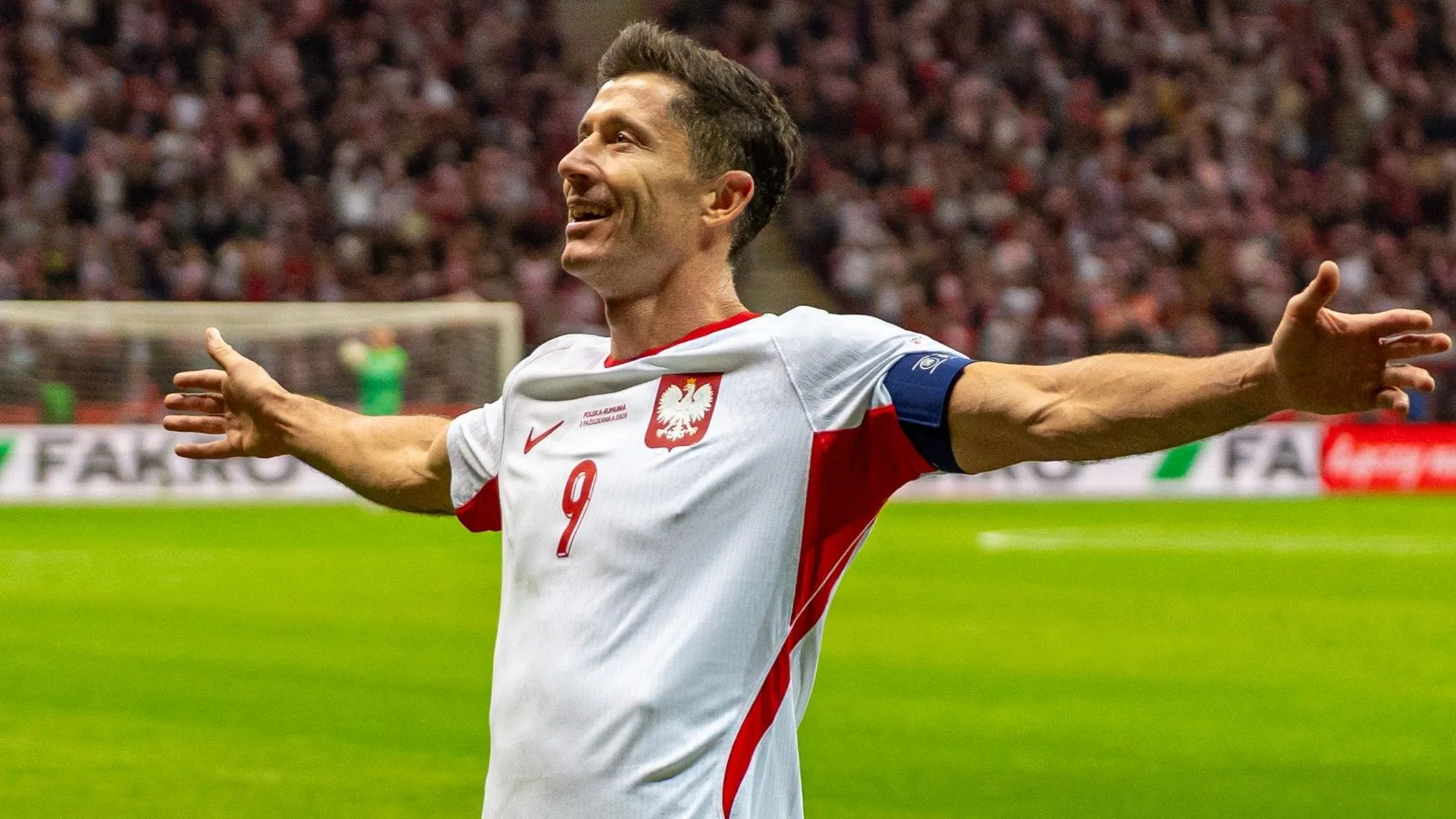 Poland striker Robert Lewandowski celebrates completing his hat-trick against Romania in the Nations League