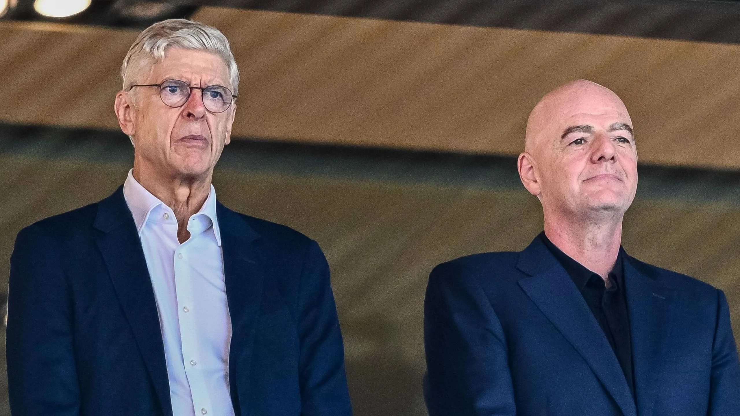 Arsene Wenger and Gianni Infantino stood alongside one another