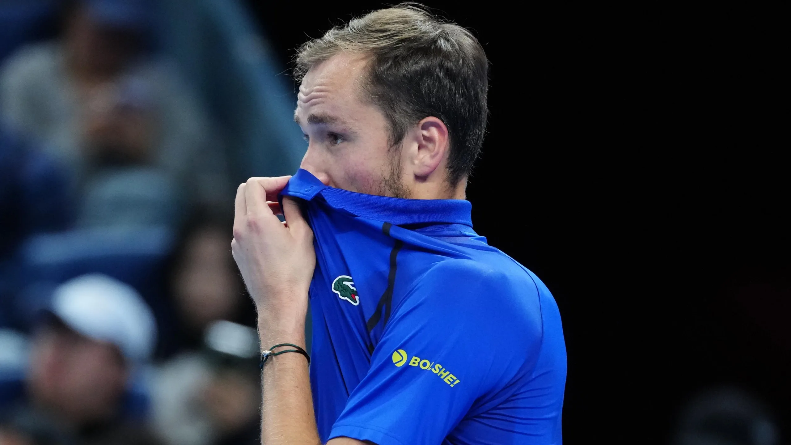Daniil Medvedev covers his face during the China Open