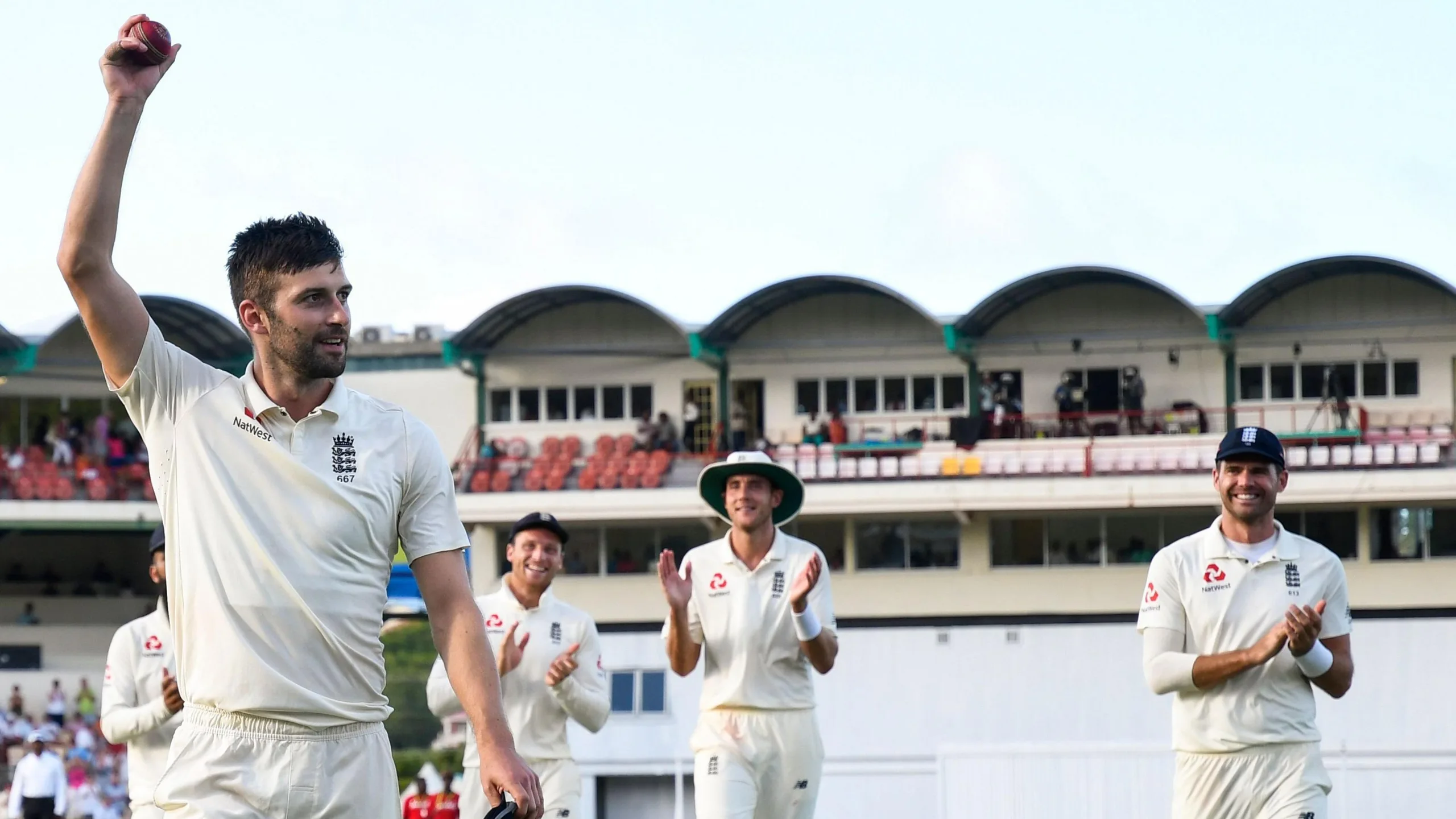 Mark Wood raises ball to crowd after taking five wickets in Saint Lucia