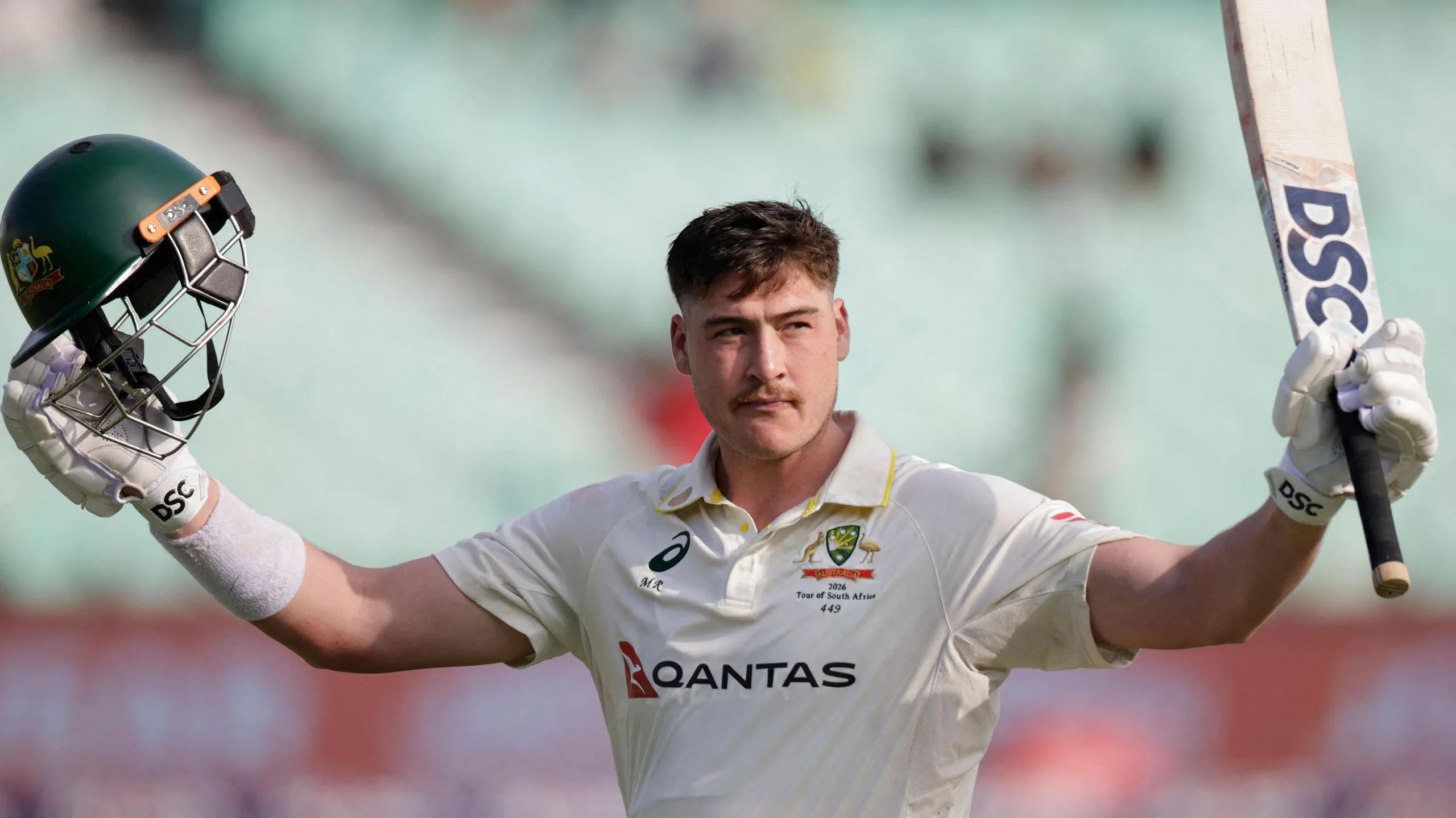 Matt Renshaw raises his bat after being dismissed