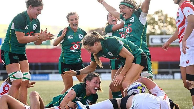 Ireland celebrate Anna McGann's first-half try against Japan
