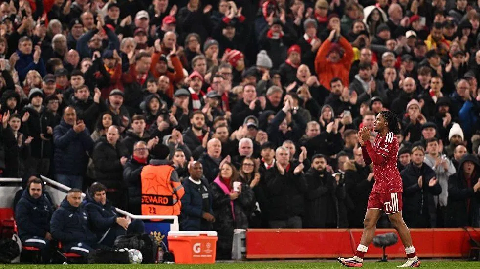 Rio Ngumoha walks off to a standing ovation from the Anfield crowd.