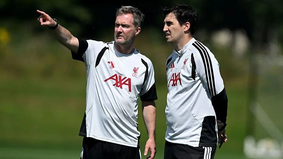 Liverpool's academy director Alex Inglethorpe chatting with Liverpool manager Andoni Iraola