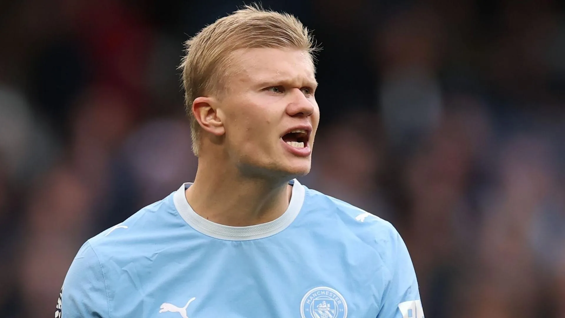 A head and shoulders image of Manchester City striker Erling Haaland