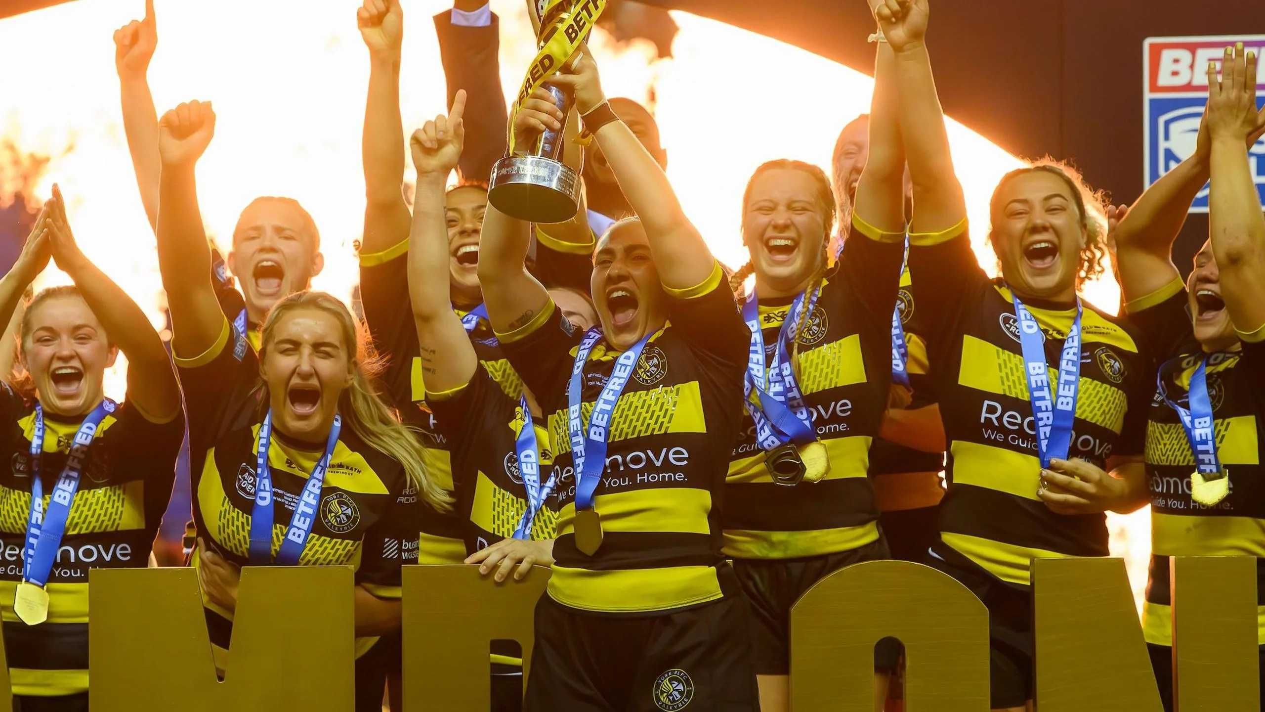 York players lift the trophy