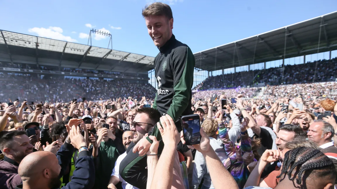 Fabian Hurzeler celebrates St Pauli's promotion to the Bundesliga with fans in 2024