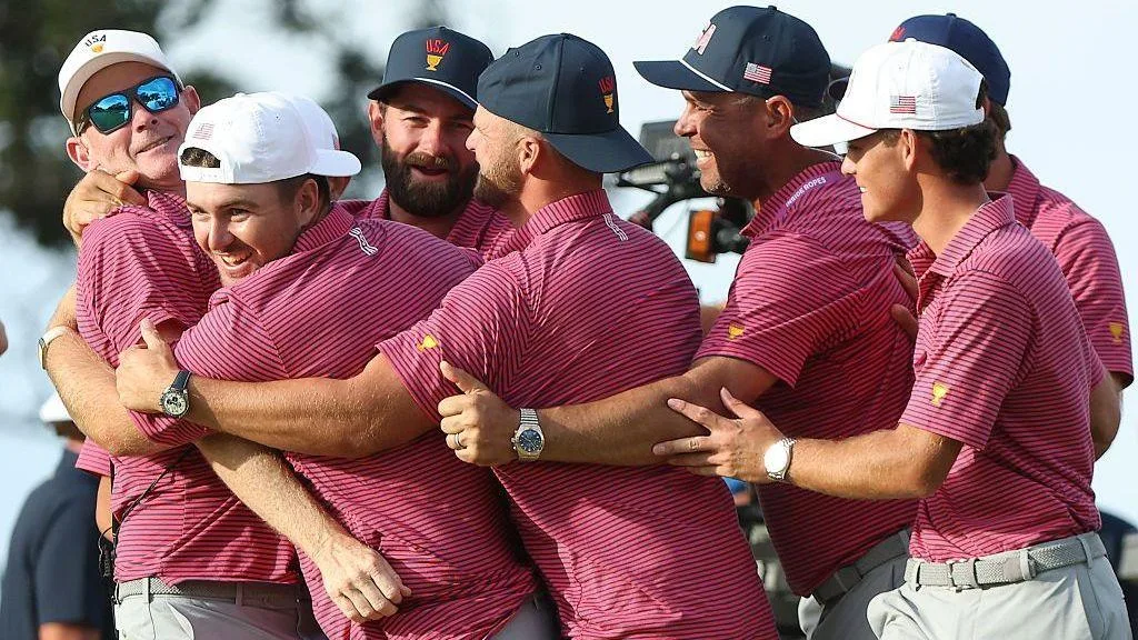The US Presidents Cup team celebrating with captain Brandt Snedeker