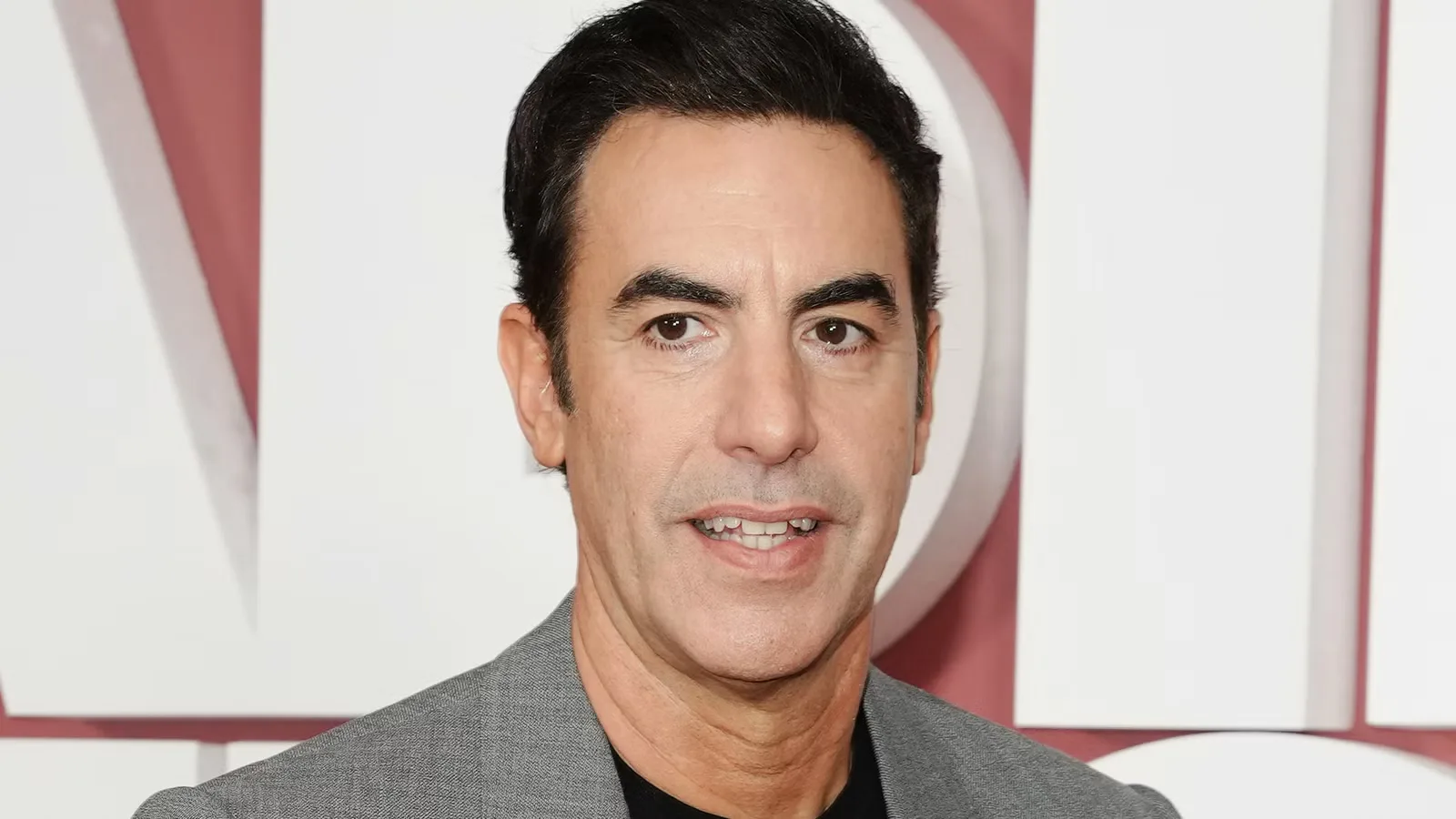Sacha Baron Cohen Officially Resurrects Another of His Most Infamous Characters in Directorial Debut  [Exclusive]