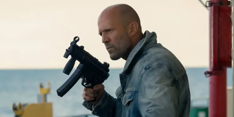 Cole Reed (Jason Statham) holds a gun in 'Mutiny'