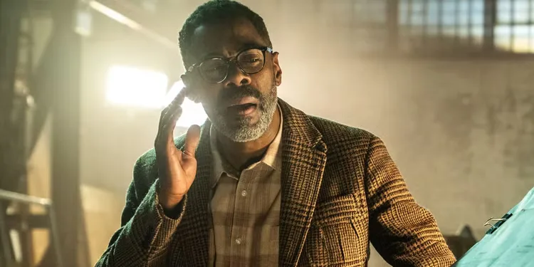 Colman Domingo as Hugo standing in a warehouse in Disclosure Day.