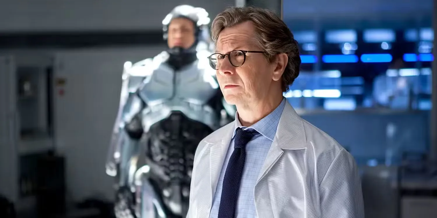 Gary Oldman in a lab coat looking ahead in RoboCop