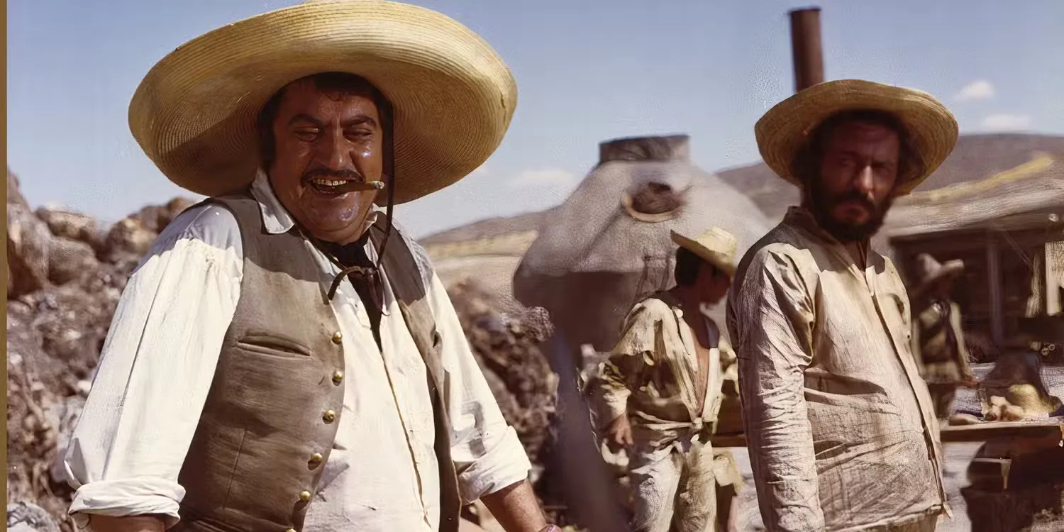 Two men looking to their left in The Mercenary (1968)