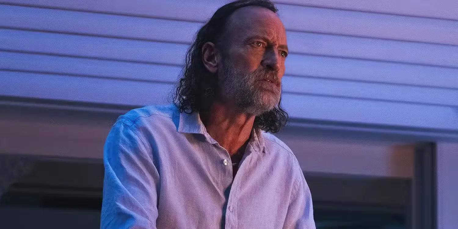 Troy Kotsur sat with a frustrated look on his face in 'Primate'