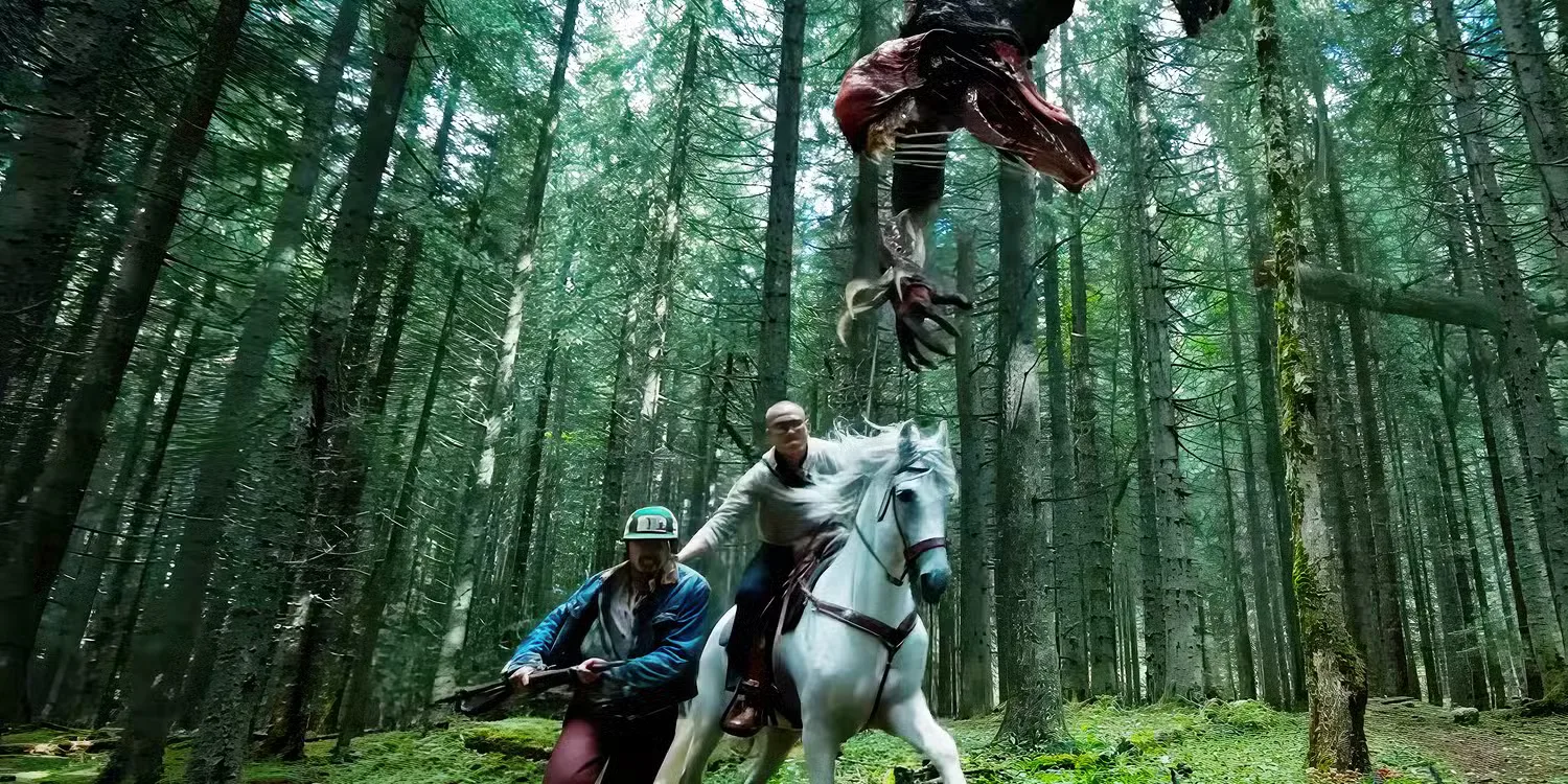 Two men battling an alien creature falling from the sky in Hope 