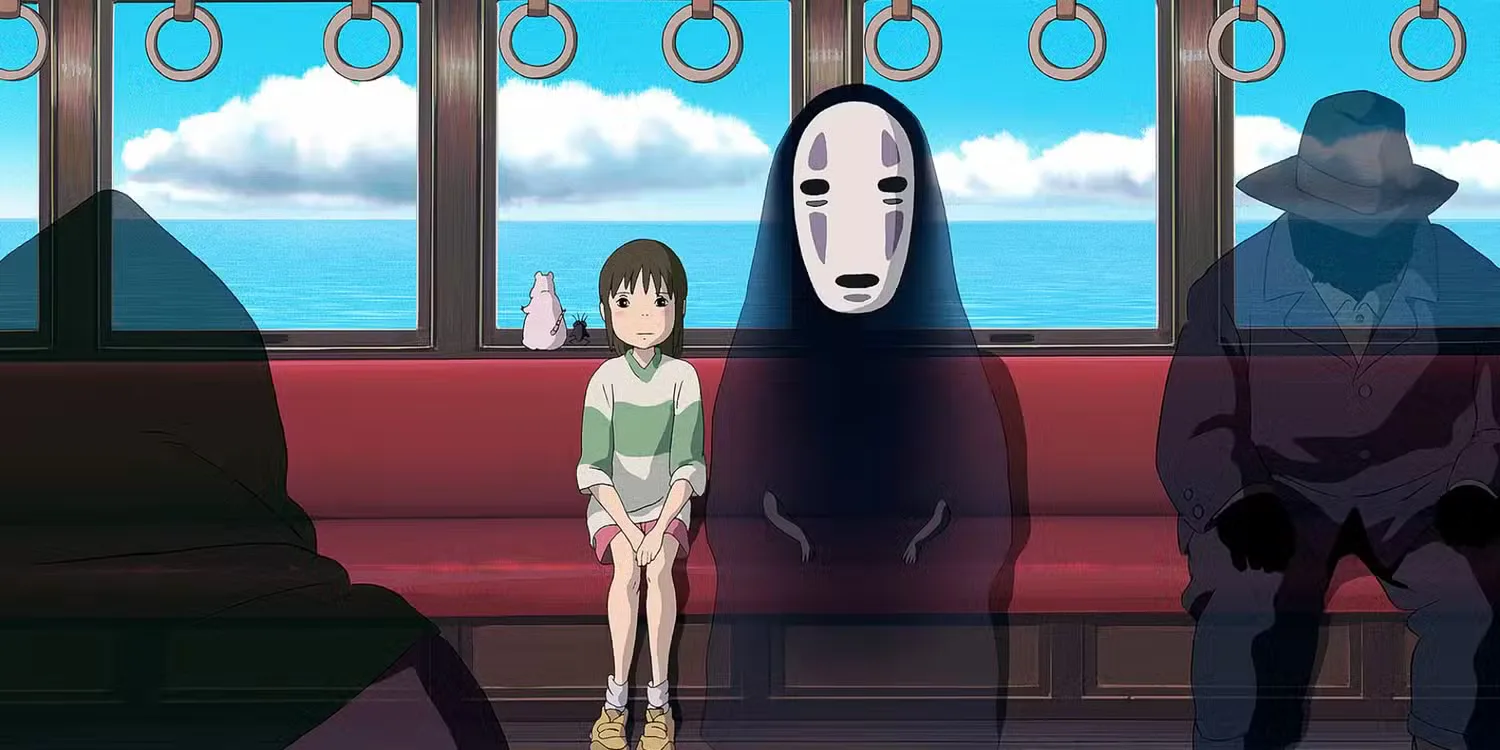 Chihiro and No-Face on a train during a scene from Spirited Away (2001)