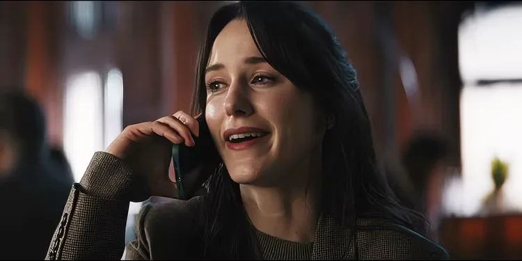 Rachel Brosnahan talking to someone in The Amateur