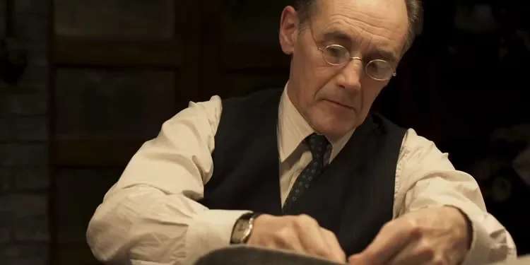 Leonard, played by Mark Rylance, working on a suit in The Outfit