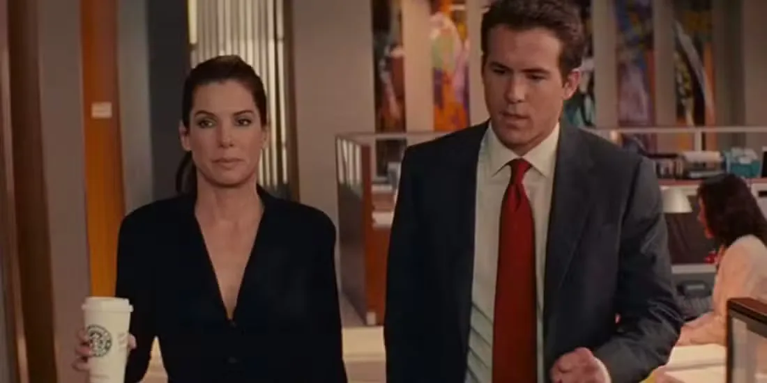 Sandra Bullock and Ryan Reynolds at work in The Proposal