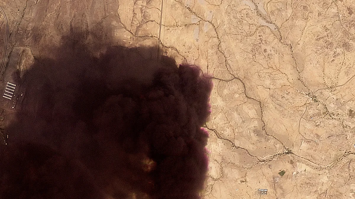FILE. This image provided by Planet Labs PBC shows a plume of black smoke rising from a Saudi Aramco oil refinery, north of Abha, Saudi Arabia, 8 Sept. 2026