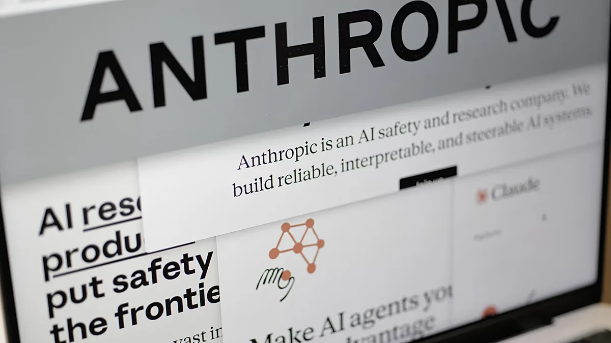 FILE. Pages from the Anthropic website and the company's logo are displayed on a computer screen in New York, 26 Feb. 2026