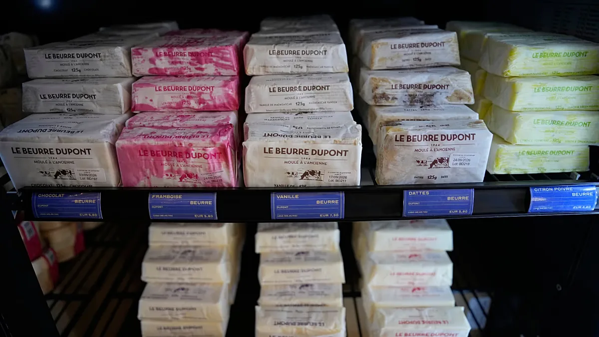 Packs of butter with different flavors are displayed in a refrigerator at Le Butter Shop, the first shop devoted entirely to butter in Paris, France