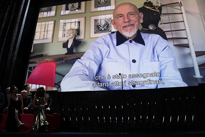 Malkovich accepting Best Actor in Venice