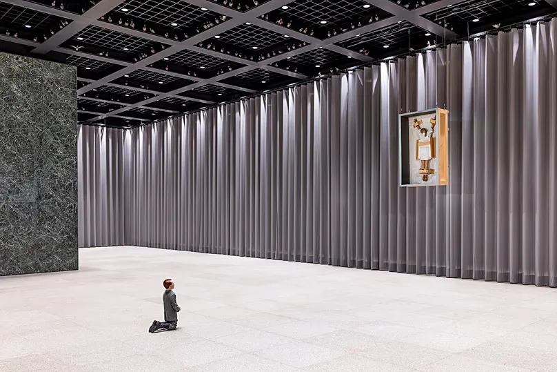 Maurizio Cattelan’s controversial sculpture Him shows Adolf Hitler kneeling in a gesture resembling prayer.