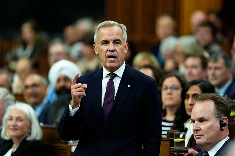 Canada Prime Minister Mark Carney rises during Question Period in the House of Commons on Parliament Hill in Ottawa on Monday, Oct. 5, 2026