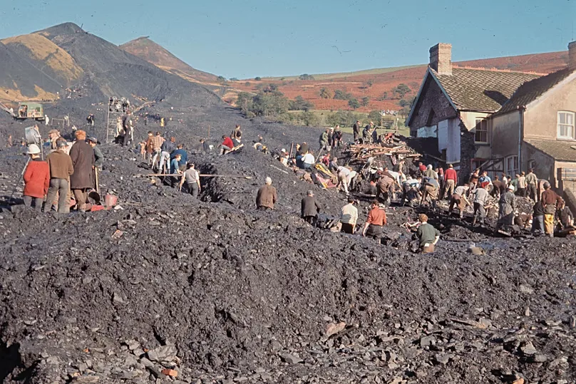 Rescue workers dug through the mining waste that buried the Junior School in Aberfan in 1966. FILE.
