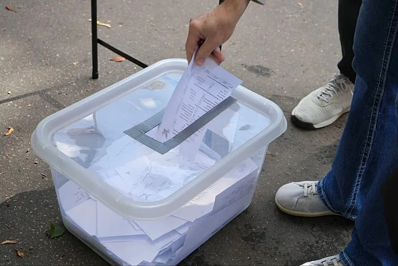 Improvised ballot box for exit poll questionnaires