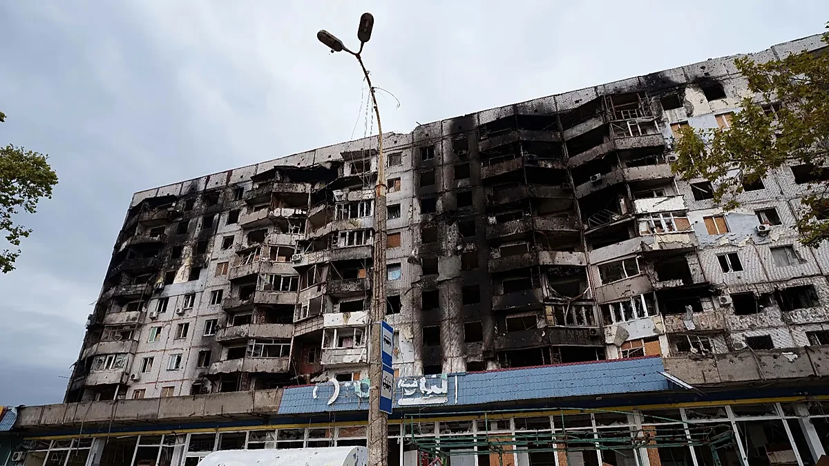 Building damaged from Russian attacks is seen during a local ceasefire related to a humanitarian aid mission in Oleshky, in Kherson, Ukraine, Thursday, Oct. 29, 2026.