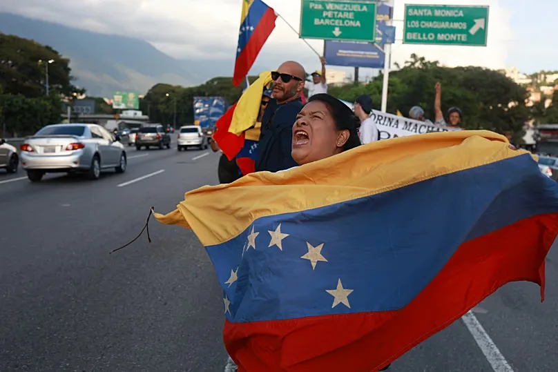 Supporters of María Corina Machado celebrate her return to the country on Sunday 25 October 2026.