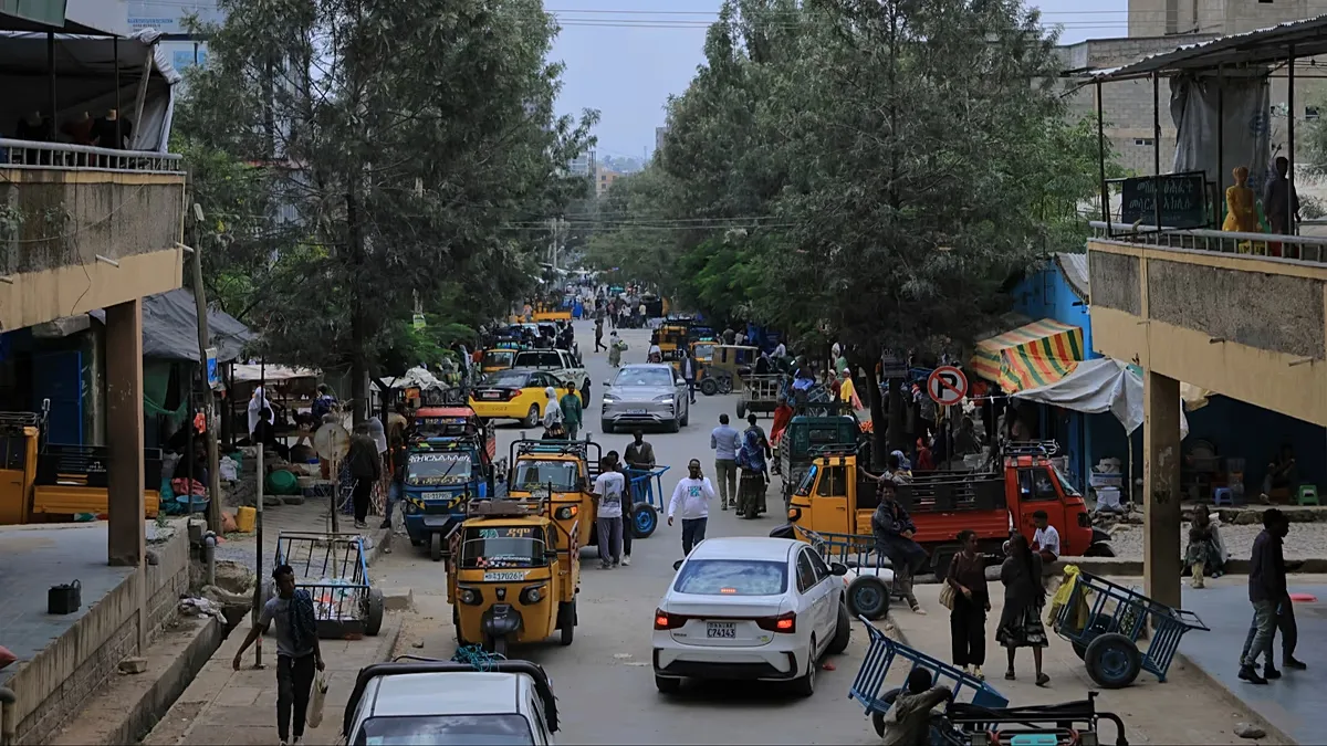 People walk in Mekelle, the capital of Ethiopia's Tigray region, as fighting escalates with the central government, 24 September 2026