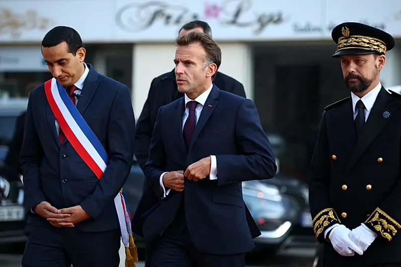 Emmanuel Macron on site, alongside the mayor of Trappes, Ali Rabeh, and the prefect of Yvelines, Brice Blondel.