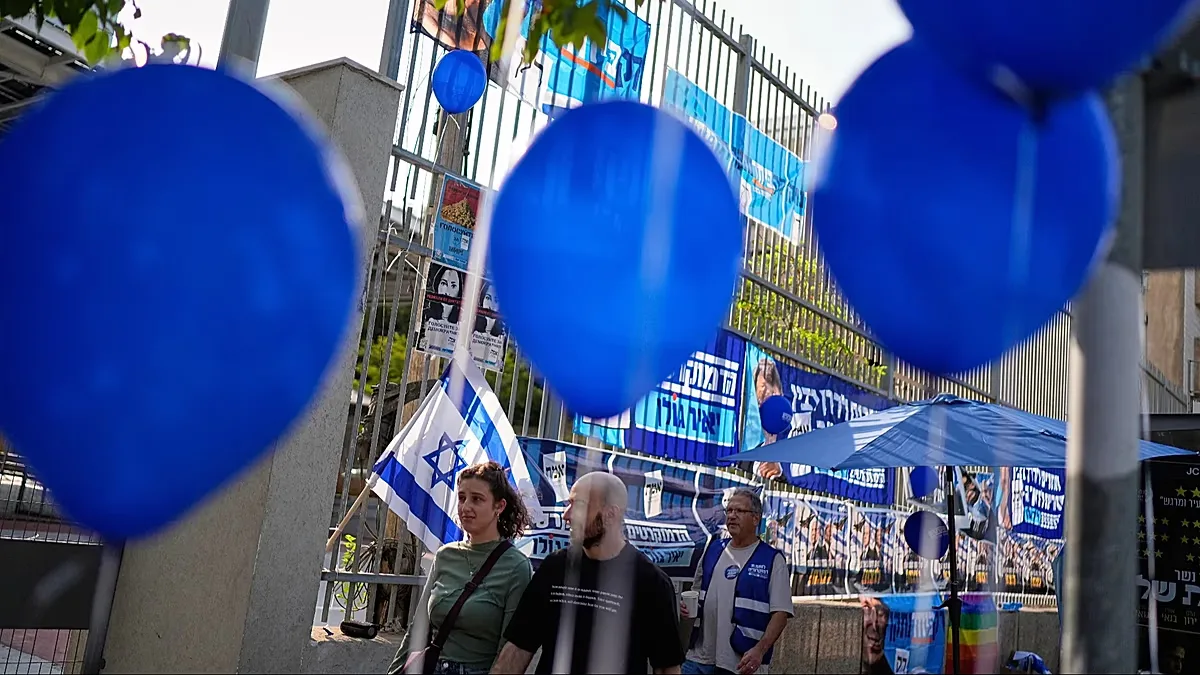 Voters enter a polling station to cast their ballots during Israel's general election in Tel Aviv, Israel, Tuesday, Oct. 27, 2026.