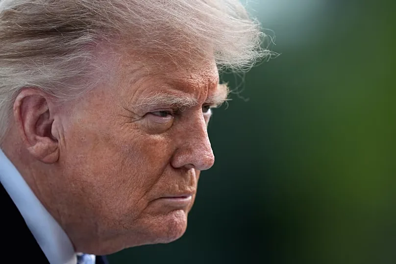 US President Donald Trump talks with reporters on the South Lawn of the White House, 23 September, 2026