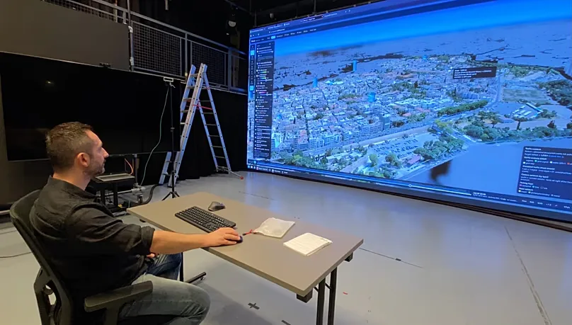 Computer scientist Panayiotis Charalambous works on an interactive map of the city of Nicosia
