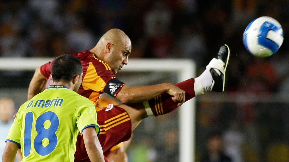 FILE: Schalke's Christian Pander fights for the ball with Galatasaray's Hasan Sas during the friendly match at the Arena AufSchalke in Gelsenkirchen, 15 January 2005
