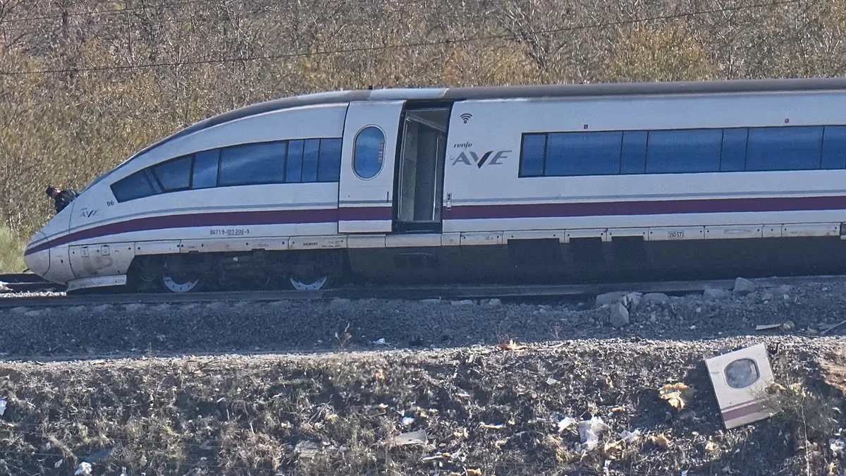 View of the site of wrecked train carriages following a collision between two trains in Urda, Spain, Friday, Oct. 30, 2026.