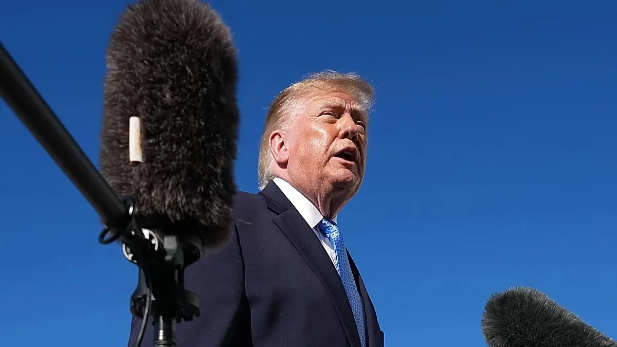 President Donald Trump talks to reporters before boarding Air Force One, at Joint Base Andrews, Md., Monday, Oct. 26, 2026.